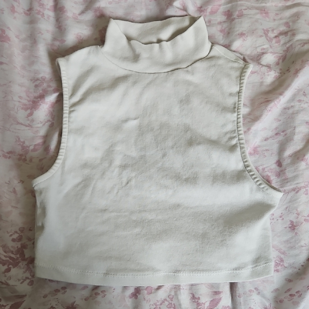Sleeveless Cream Turtleneck Top